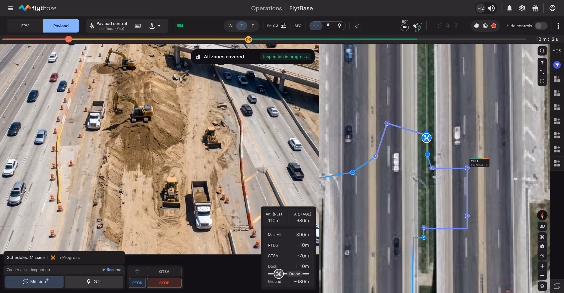 Drone capturing close-up imagery of a bridge truss and underside structure