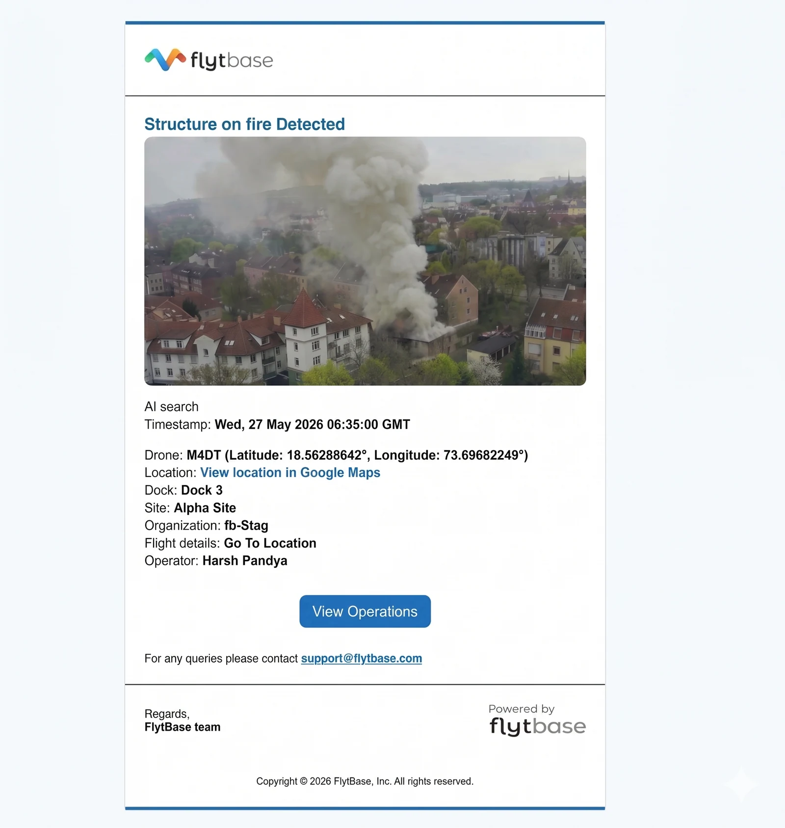 Email alert: "Structure on fire Detected." Includes the captured still, timestamp, drone, dock, site, organisation, flight context, and a one-tap link back into operations.