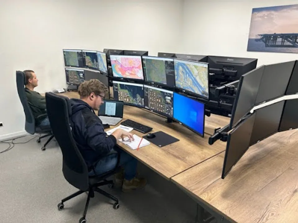 Skeye field operator with a docked drone in active deployment.
